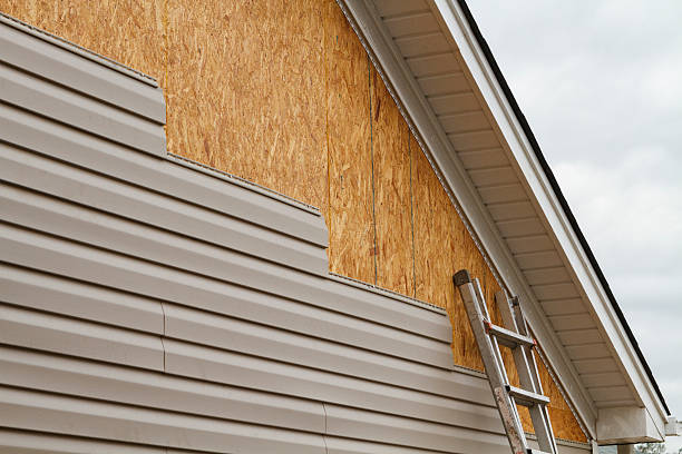 Professional Siding Repair technician working in Central City, PA